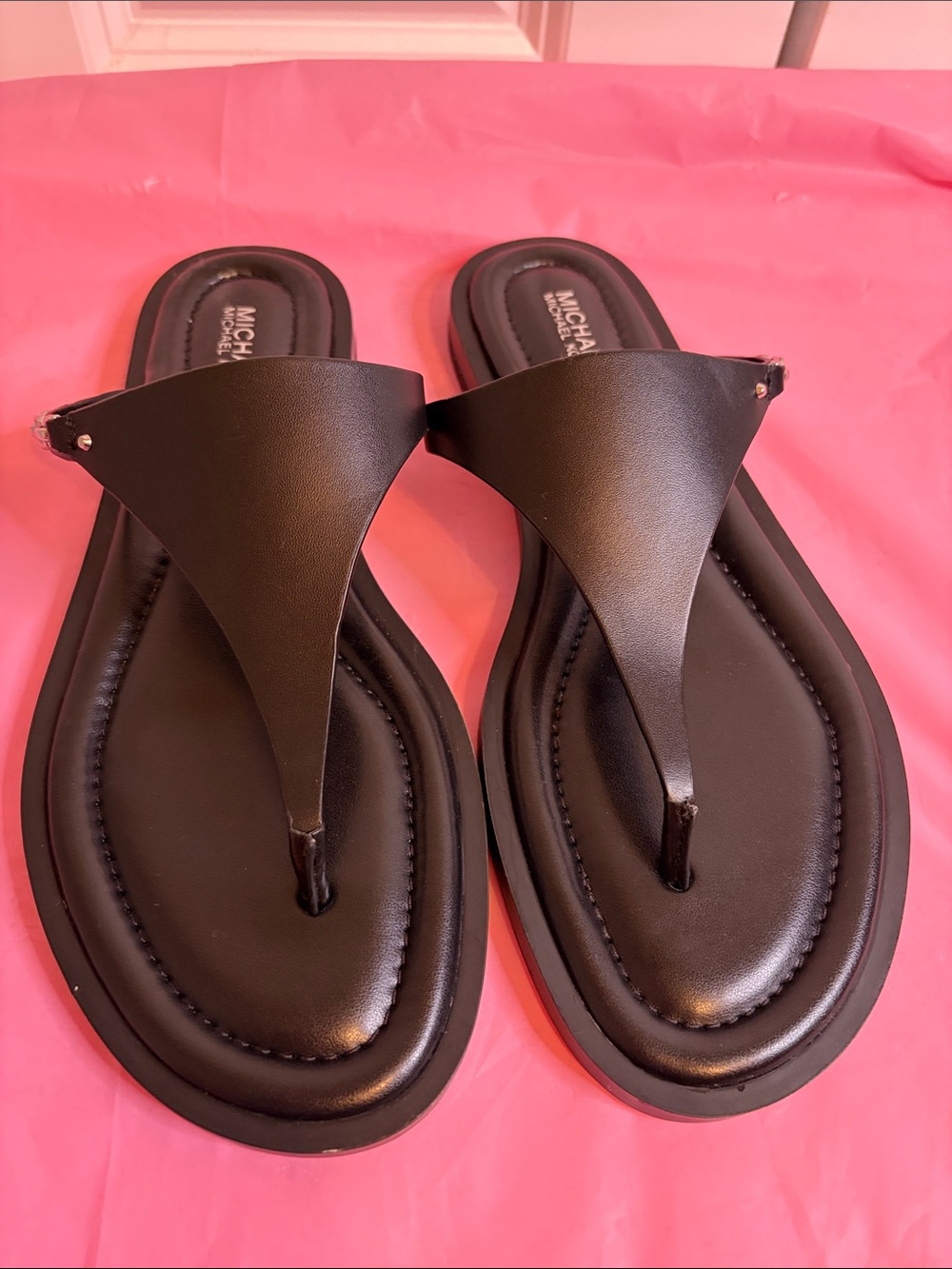 MICHAEL Michael Kors Black Leather Thong Sandals with Subtle Stud Detail